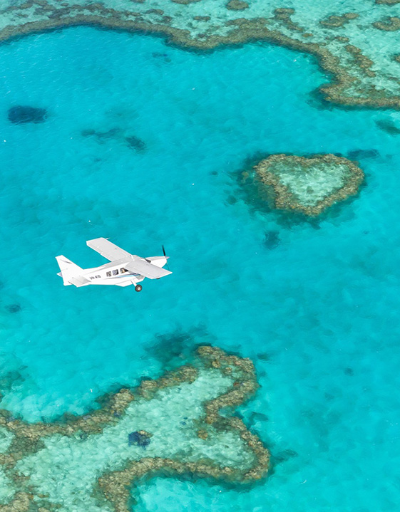 Fly over the Whitsundays Heart Reef