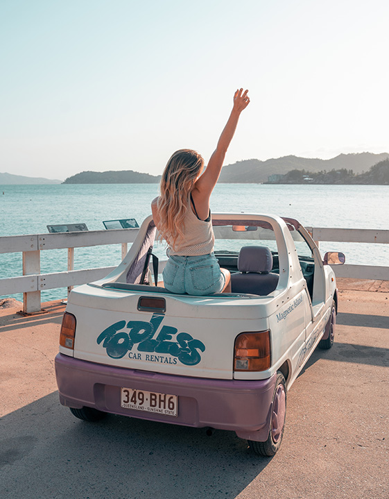 Explore Magnetic Island in topless Barbie cars