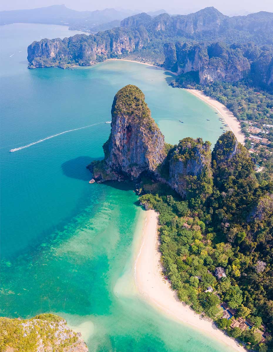 Relax & sip coconuts on the white sands of Railay Beach