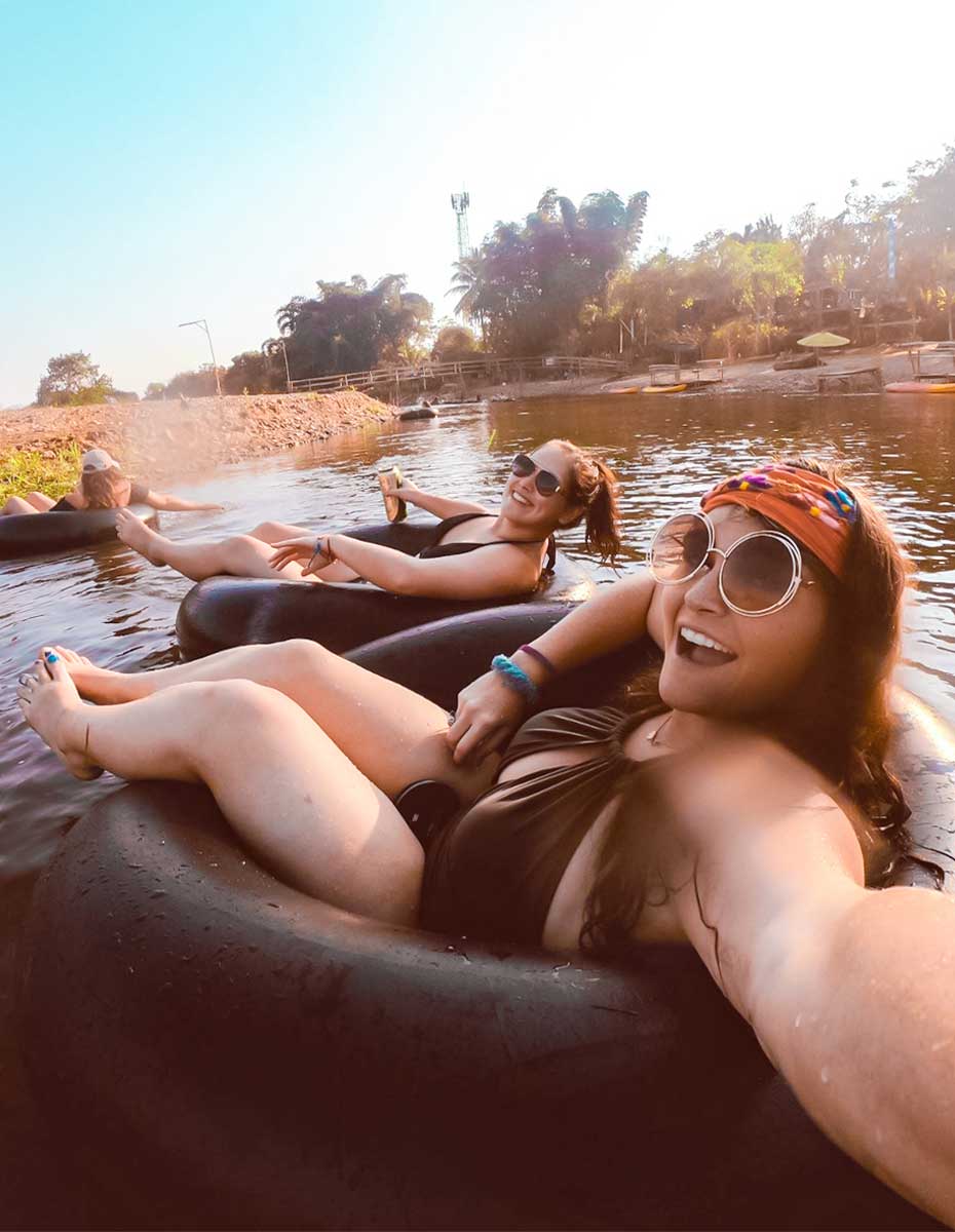 Grab a tube and float down the river during sunset